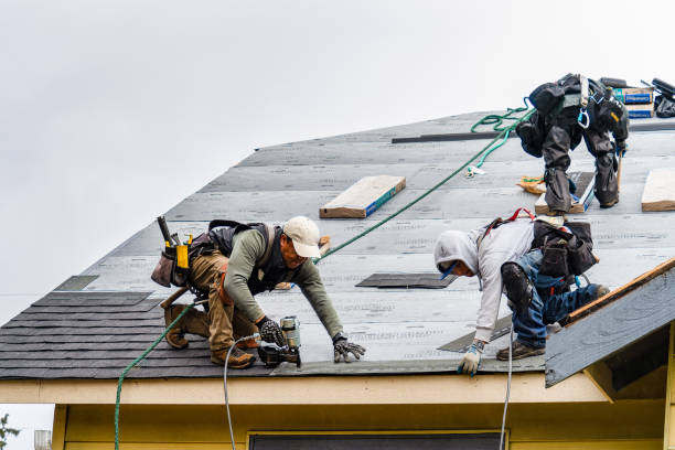 Professional Roofing technician working in Richland, NY